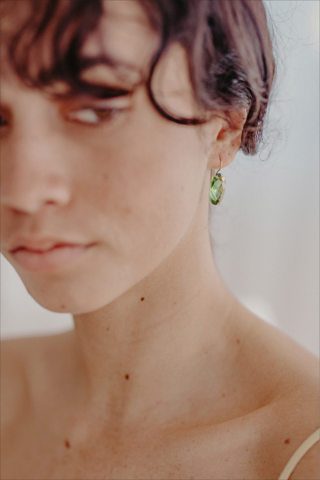 Peridot green oval cut faceted earrings