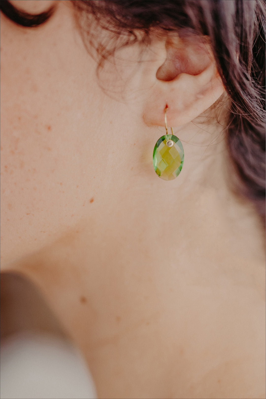 Peridot green oval cut faceted earrings